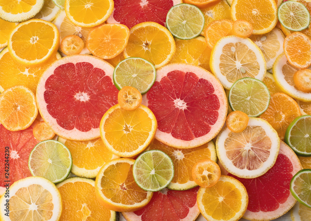 Fresh citrus fruits colorful background Fresh citrus fruits colorful background