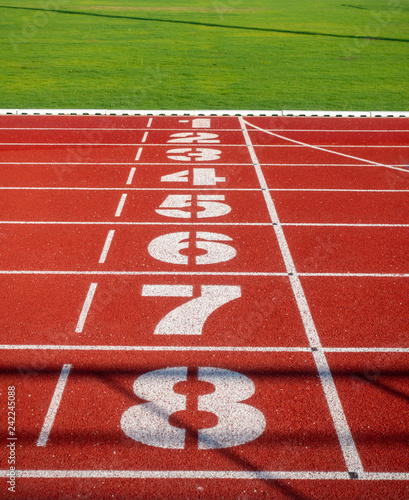 Red running track in stadium
