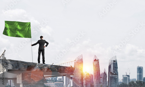 Man with flag presenting leadership concept.