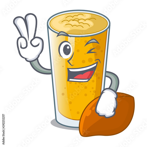 Two finger lassi mango in a cartoon bottle