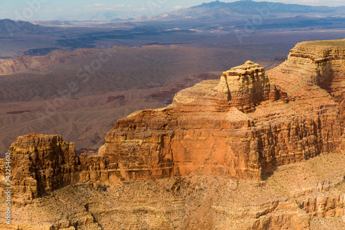 landscape and nature concept - aerial view of grand canyon cliffs from helicopter