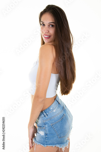 young woman casual portrait beautiful model posing in studio over white background © OceanProd