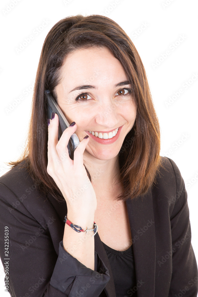 Young elegant woman with smartphone talking on mobile phone against white background Young elegant woman with smartphone talking on mobile phone against white background