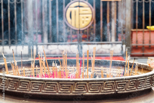 Closeup view of burning incense in Wenshu Temple, Chengdu, China photo