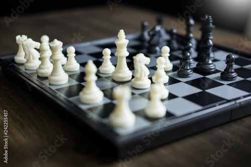 Chess set on the chess board of business ideas and competition and stratagy plan success meaning.