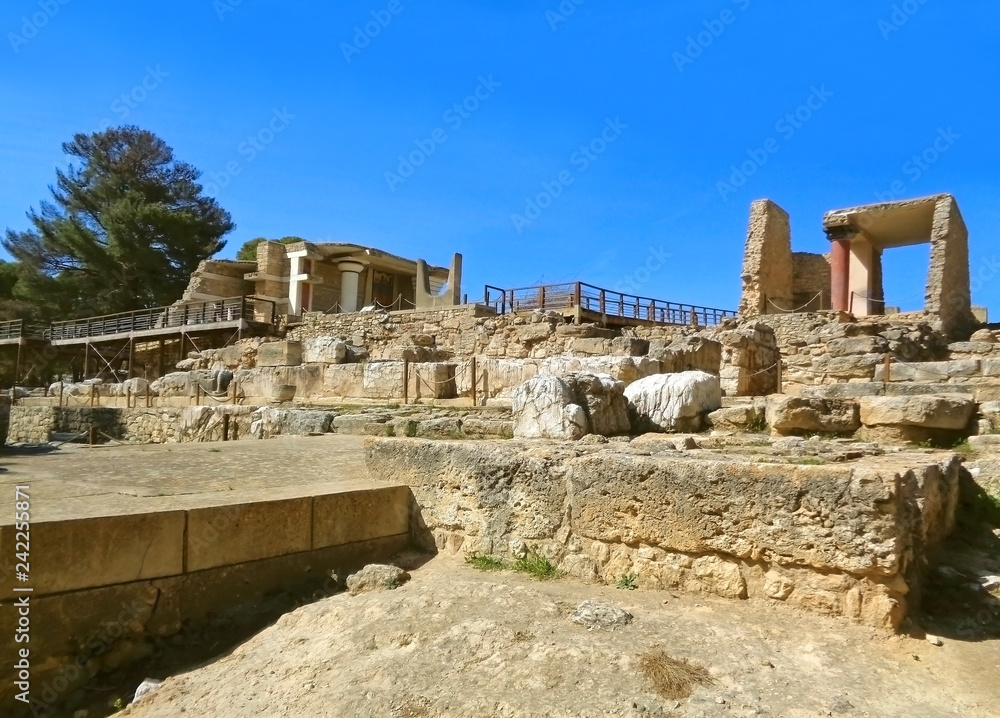 The South Entrance of Palace of Knossos against Vivid Blue Clear Sky of Crete Island, Greece 