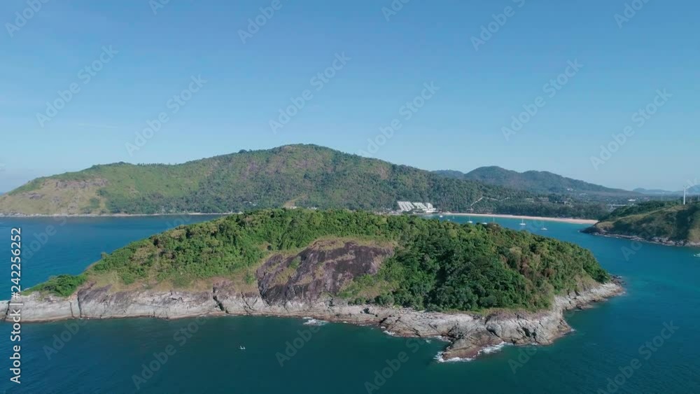 Aerial view drone shot flying over Beautiful Small island in tropical sea,good weather day beautiful sea and beautiful water surface Aerial view drone shot flying over Beautiful Small island in tropical sea,good weather day beautiful sea and beautiful water surface