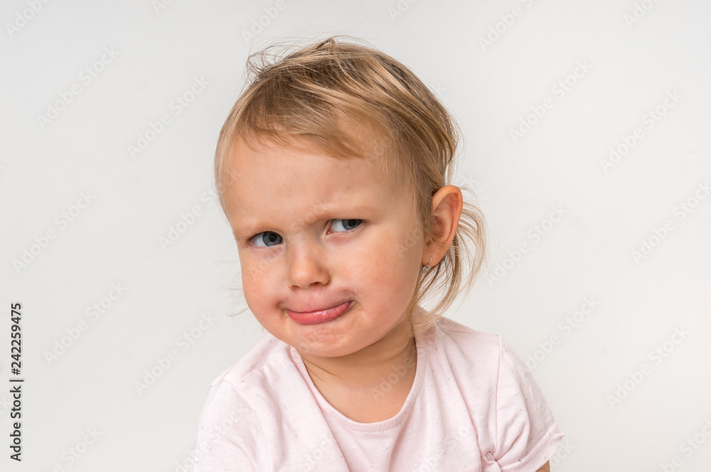 Little baby with sad expression in face Little baby with sad expression in face