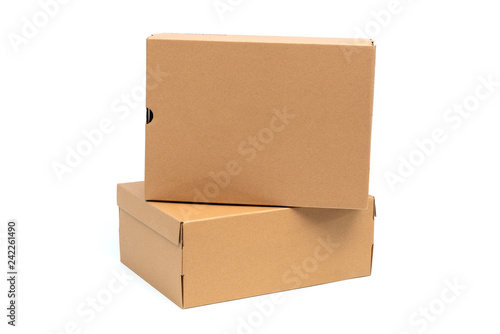 Brown cardboard shoes box with lid for shoe or sneaker product packaging mockup, isolated on white with clipping path. photo