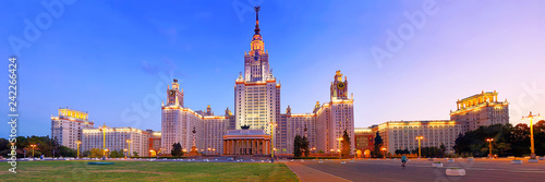 Wide angle vibrant panoramic evening view of nicely illuminated famous Russian university