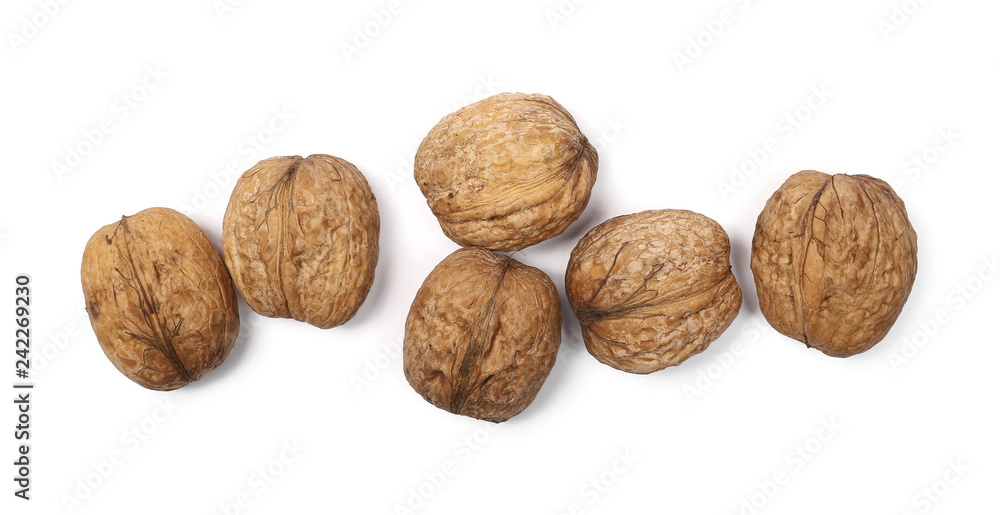 Walnuts, isolated on white background, top view Walnuts, isolated on white background, top view