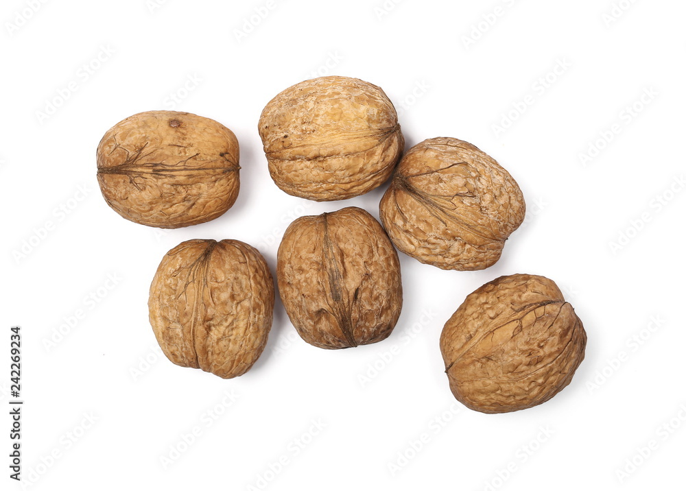 Walnuts, isolated on white background, top view Walnuts, isolated on white background, top view