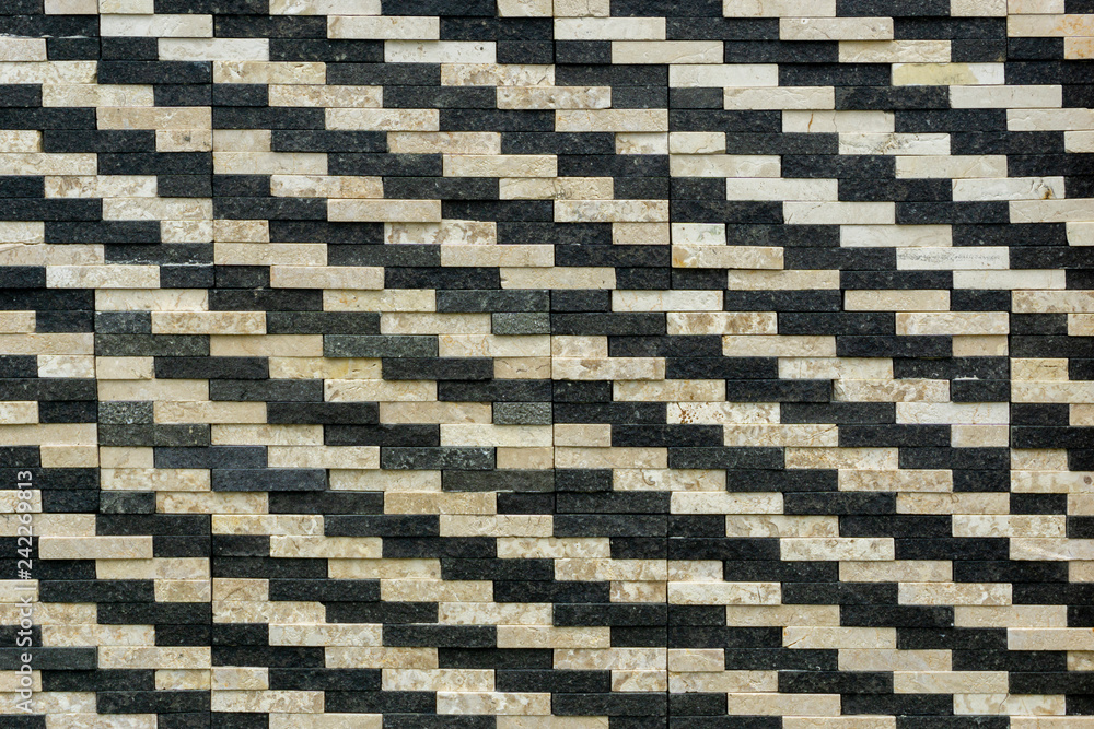 Obraz premium black and creme color marble stone stacked pattern background wallpaper backdrop