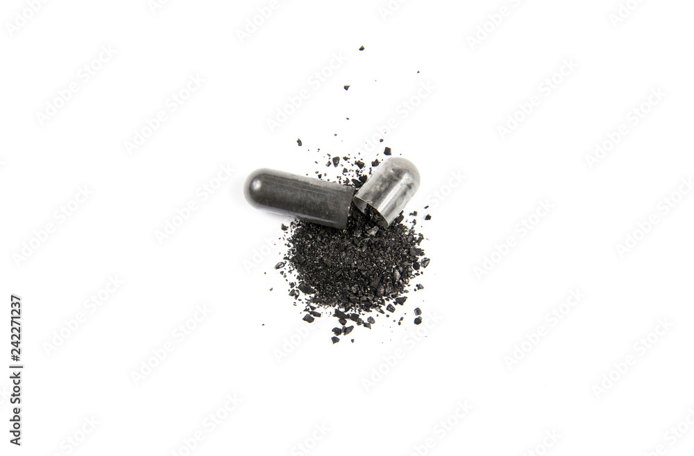 Opened activated charcoal capsule also known as activated carbon as