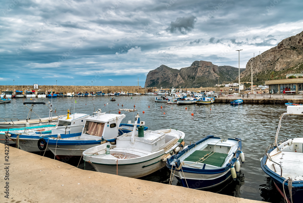 Fishing boats in the small harbor of Isola delle Femmine or Island of Women, province of Palermo, Sicily, Italy