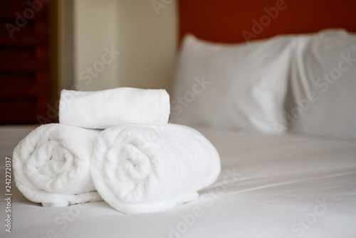 white clean towels on the bed