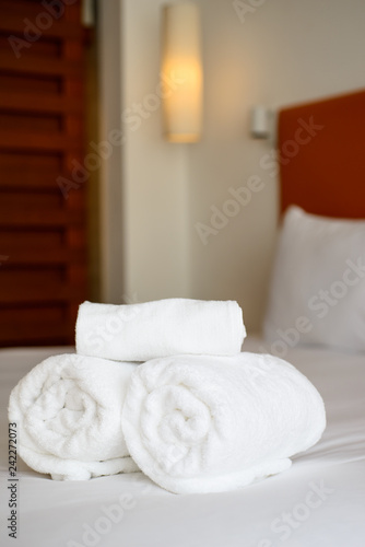 white clean towels on the bed