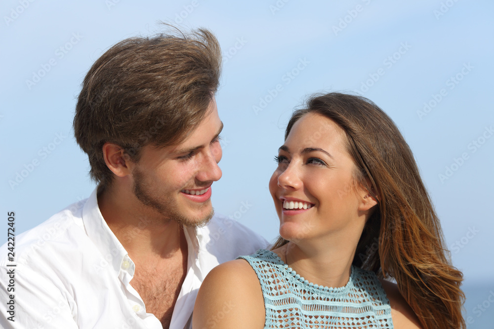 Happy couple in love looking each other Happy couple in love looking each other