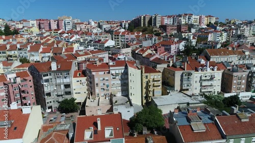 Aerial bird view footage of Lisbon residential area showing colorful Arroios neighbourhood apartments located in the western european capital city center beautiful summer day 4k high resolution photo