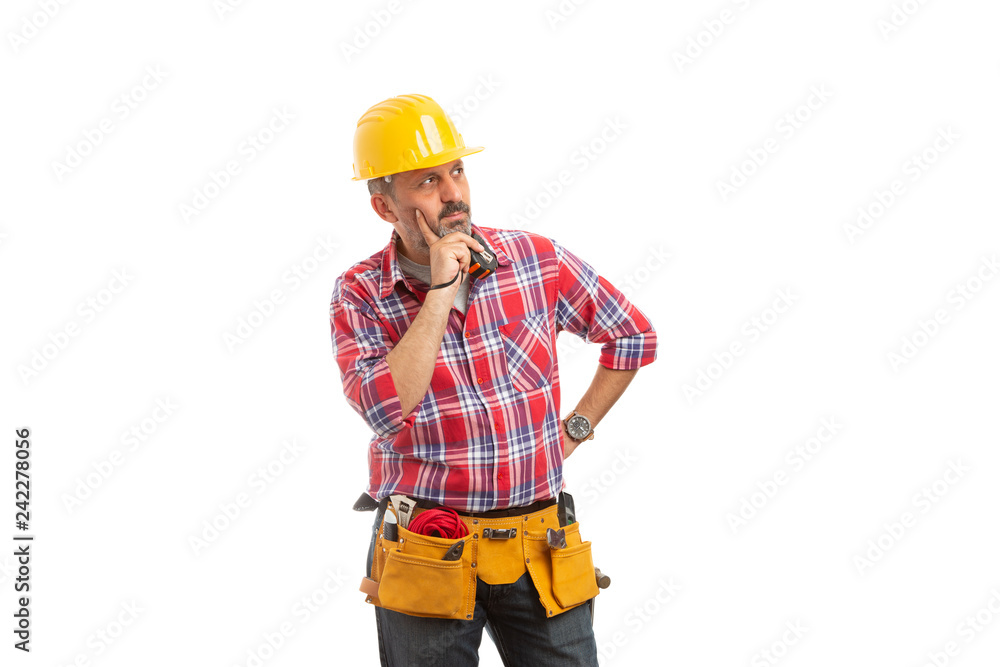 Builder analyzing with focused expression. Builder analyzing with focused expression.