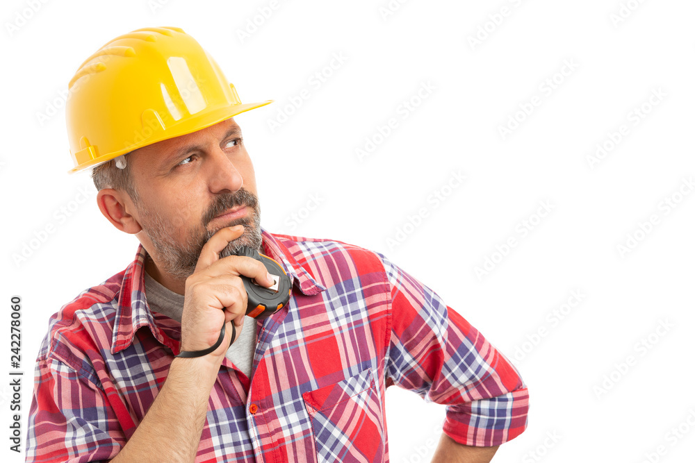 Close-up of constructor thinking . Close-up of constructor thinking .
