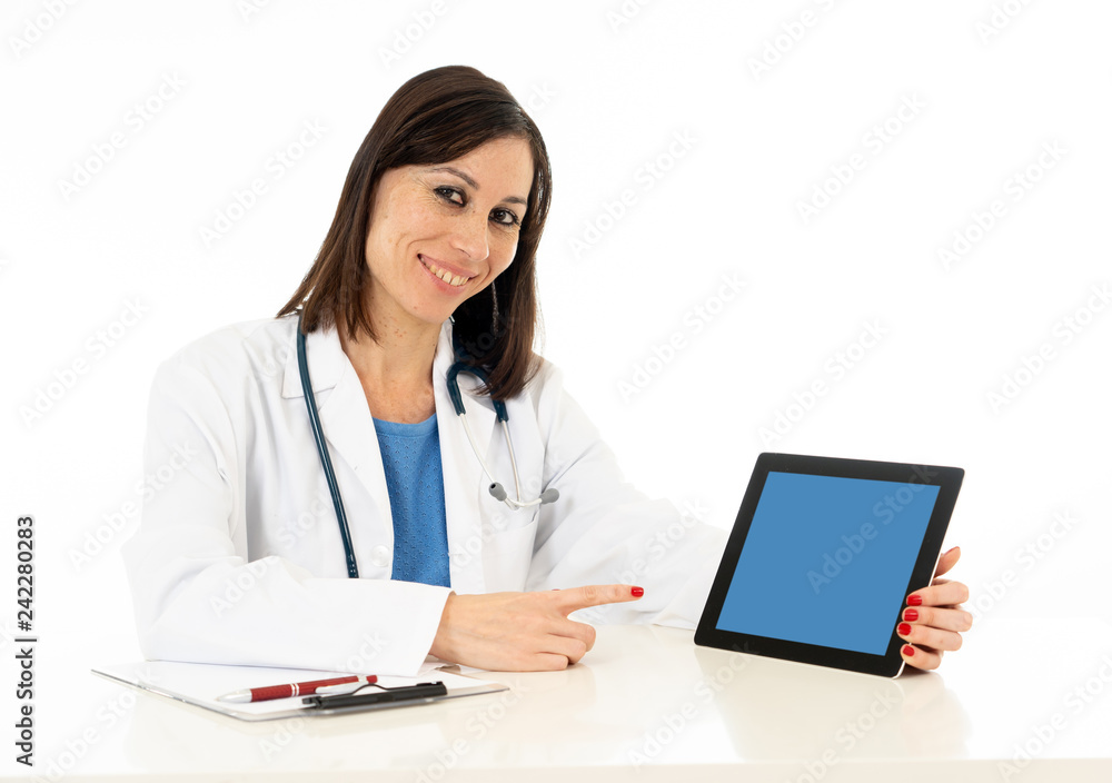 Woman doctor working in Hospital office holding digital tablet isolated on white background Woman doctor working in Hospital office holding digital tablet isolated on white background