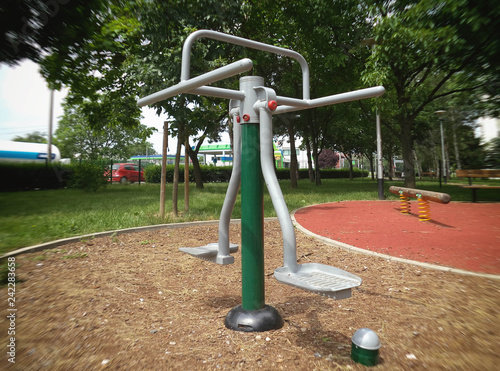 The exercise equipment in the park.
