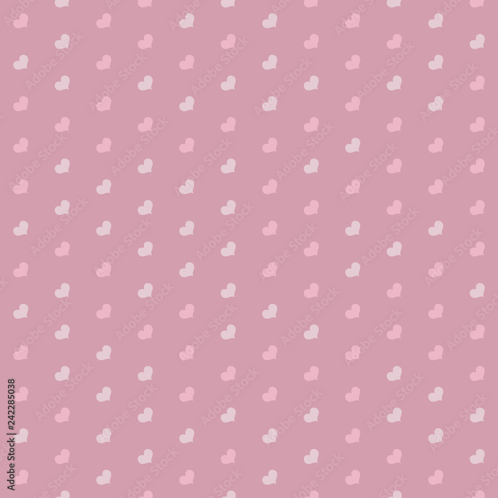 Seamless diagonal hearts pattern in shades of pink.