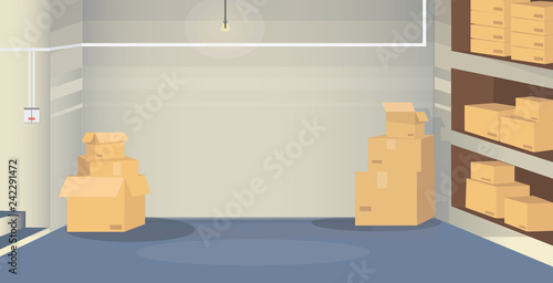  a warehouse room with boxes