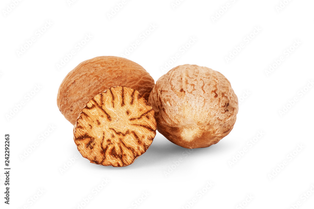 Nutmeg. Whole nut, half and powder isolated on white background Nutmeg. Whole nut, half and powder isolated on white background