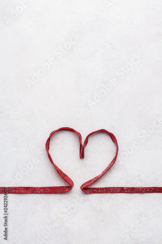 Red beetroot pasta shaped as heart. Valentine s Day greeting car