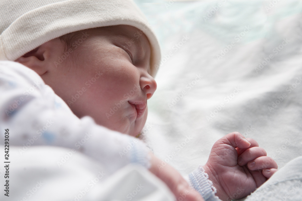 Newborn baby sleeping on side position Stock Photo Adobe Stock