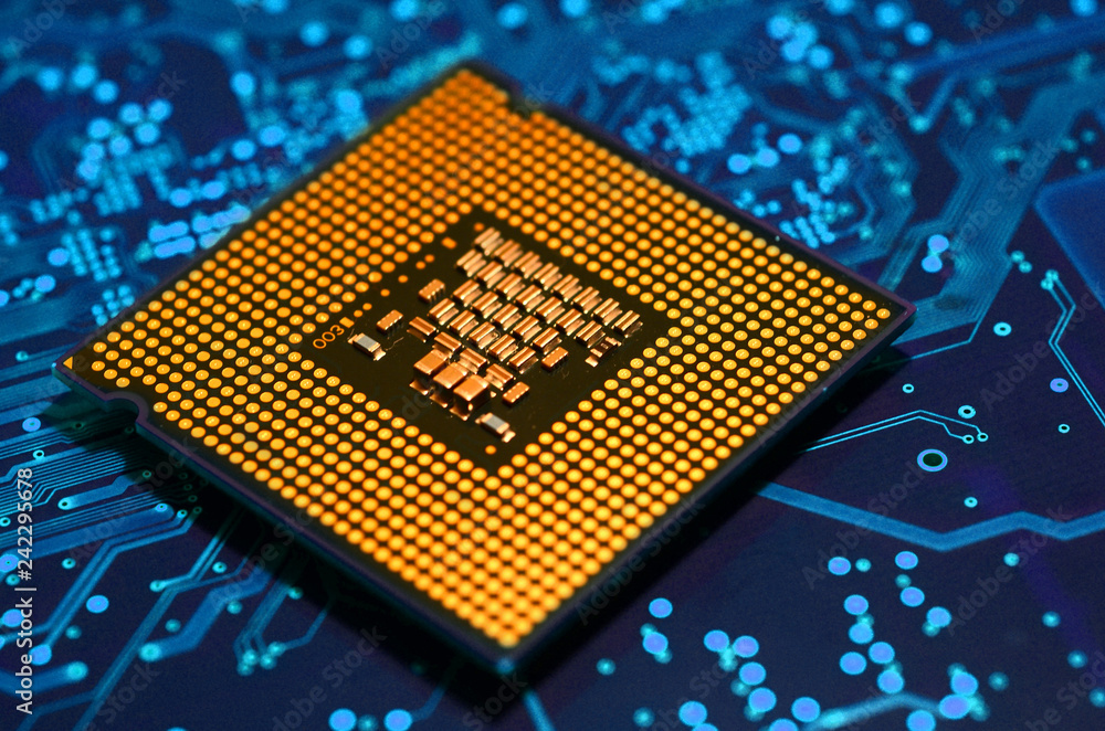cpu chip over blue electronic circuit board cpu chip over blue electronic circuit board