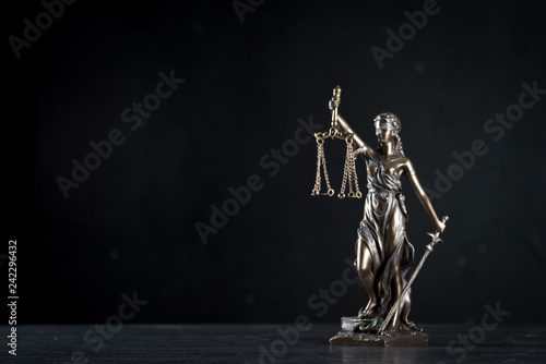 Bilde på lerret Goddess of justice on a beautiful black background