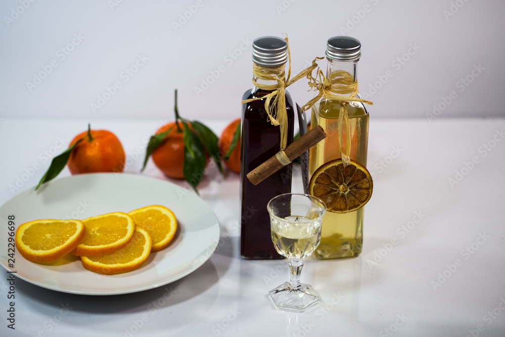 homemade liqueur, white background homemade liqueur, white background