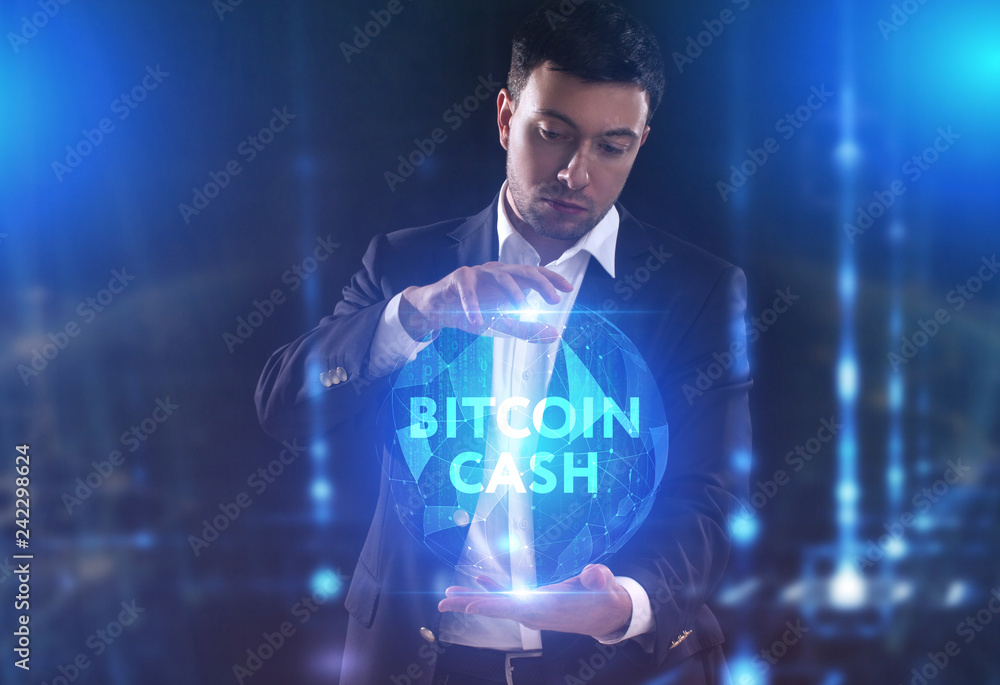 The concept of business, technology, the Internet and the network. A young entrepreneur working on a virtual screen of the future and sees the inscription: bitcoin cash The concept of business, technology, the Internet and the network. A young entrepreneur working on a virtual screen of the future and sees the inscription: bitcoin cash