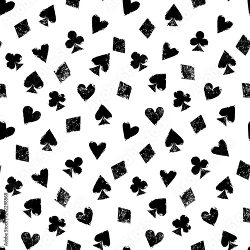 Playing cards different suits - hearts, diamonds, spades and clubs - black and white grunge seamless pattern, vector
