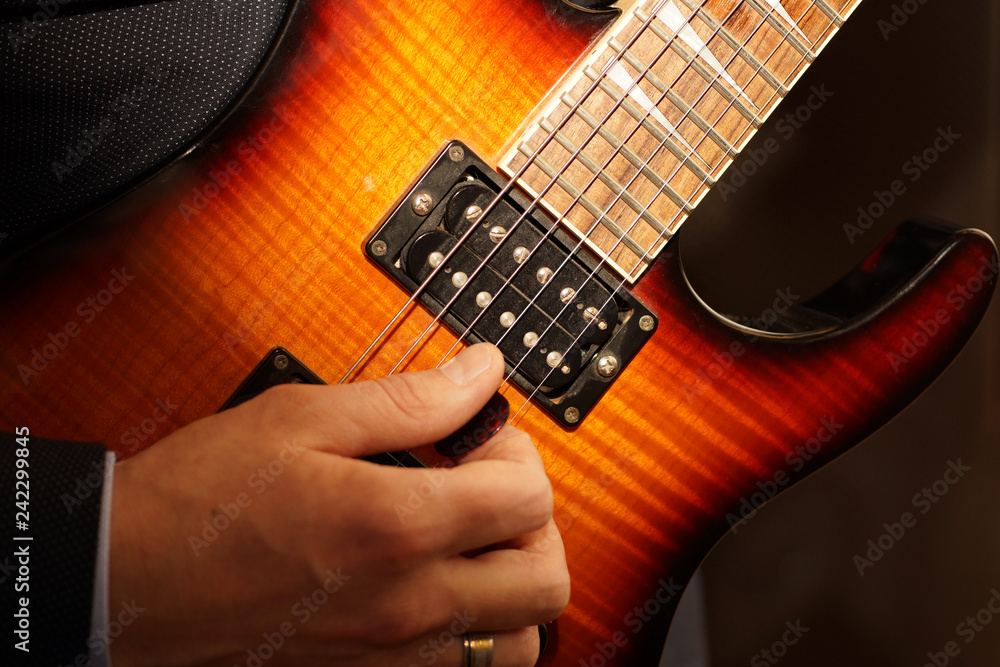Naklejka premium hand with guitar