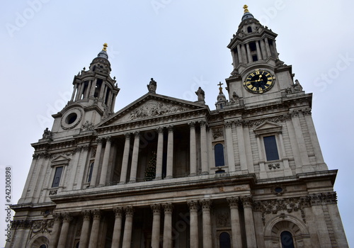 St Pauls Cathedral. Facade closeup with towers, clock and columns. London, United Kingdom.