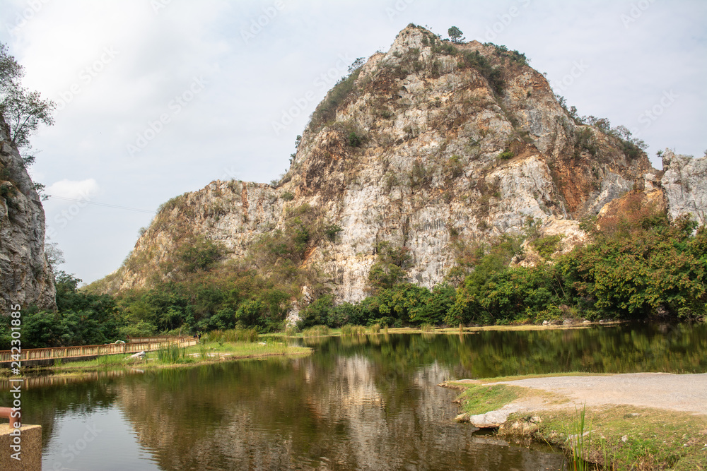 Khao Ngu Rock Park natural tourist attraction not far from Bangkok originally a rock blast source later changed to a recreation place that is a beautiful view of nature, a lake in the middle of the va