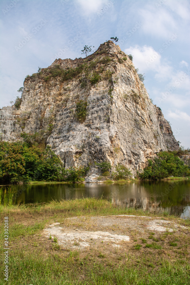 Khao Ngu Rock Park natural tourist attraction not far from Bangkok originally a rock blast source later changed to a recreation place that is a beautiful view of nature, a lake in the middle of the va