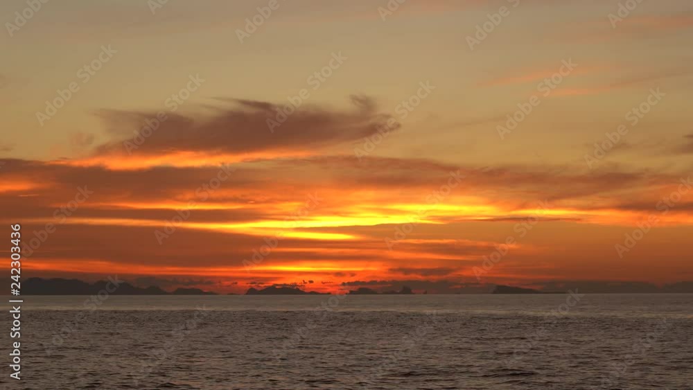 Beautiful sunset over sea water wave. Summer vacation concept. Island Koh Phangan, Thailand, establishing shot Beautiful sunset over sea water wave. Summer vacation concept. Island Koh Phangan, Thailand, establishing shot