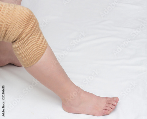 Orthopedic kneecap to relieve the load and fix the sore knee, close-up, copy space, medical, bandage