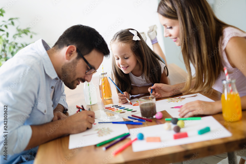 Happy family having fun time at home Happy family having fun time at home