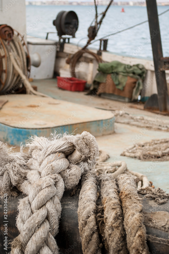 Fototapeta premium fishing ship with thick ropes