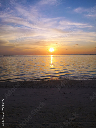 Colorful ocean beach sunset .Tropical Maldives beach.