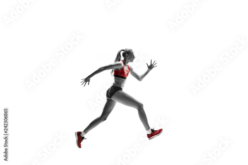 The one caucasian female silhouette of runner running and jumping on white studio background. The sprinter, jogger, exercise, workout, fitness, training, jogging concept. © master1305