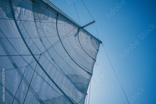 Mail Sail in 44 Feet Crusing Sailing Boat against blue sky