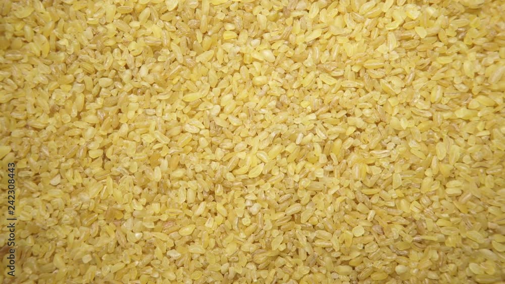 Bulgur wheat cereal food as background. Top view. Healthy diet Bulgur wheat cereal food as background. Top view. Healthy diet