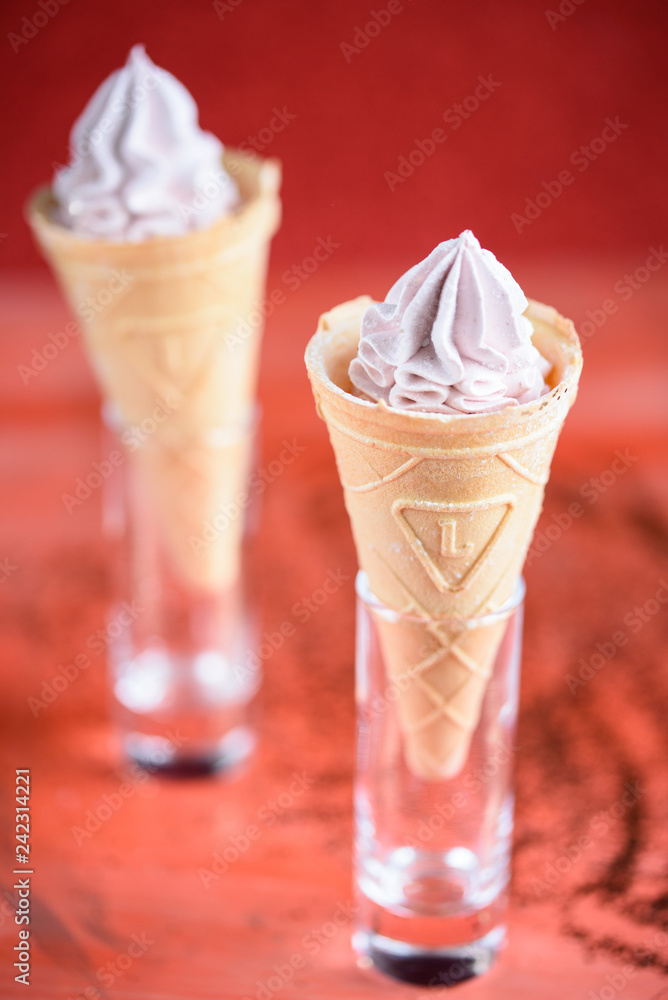Beautiful and appetizing meringue ice-cream cake. Coral background, fashionable color in 2019. Beautiful and appetizing meringue ice-cream cake. Coral background, fashionable color in 2019.